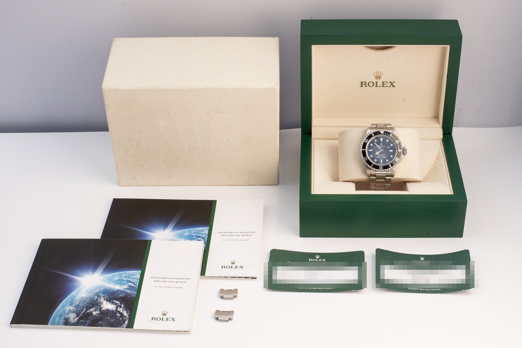 Rolex Sea-Dweller 16600 volledig compleet met doos, garantiepapieren en documentatie — dealerklare contentset